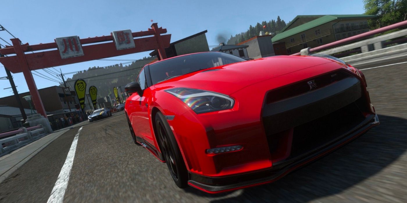 A red car on a racetrack in Driveclub