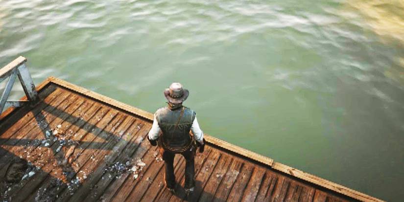 Red Dead Redemption 2 Johns Marston Staring Off Of The Docks