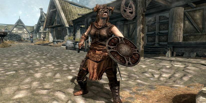 Player fights enemy with sword and shield