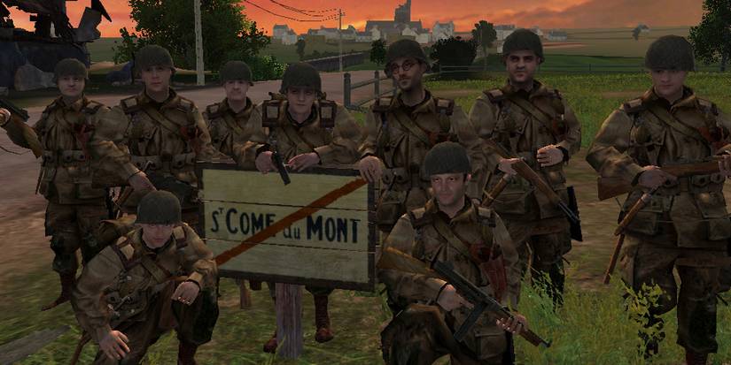 Soldiers standing next to a sign
