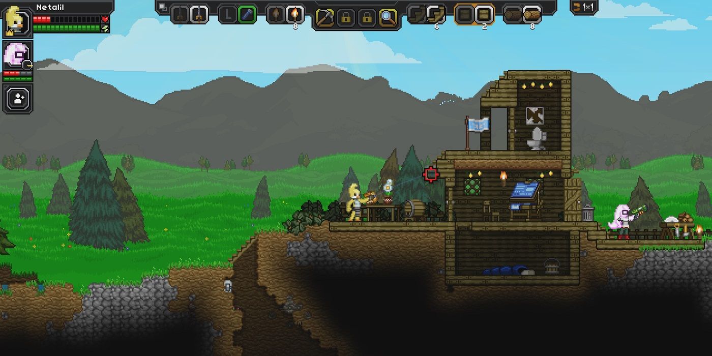 starbound building near the water and cave
