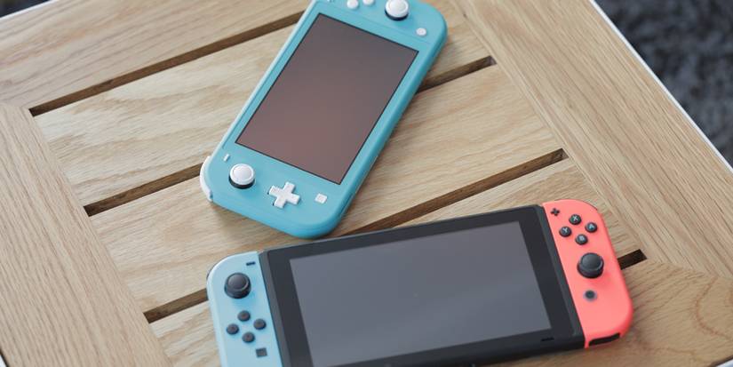 Nintendo Switch Lite Turquoise with Nintendo Switch red and blue Joycons