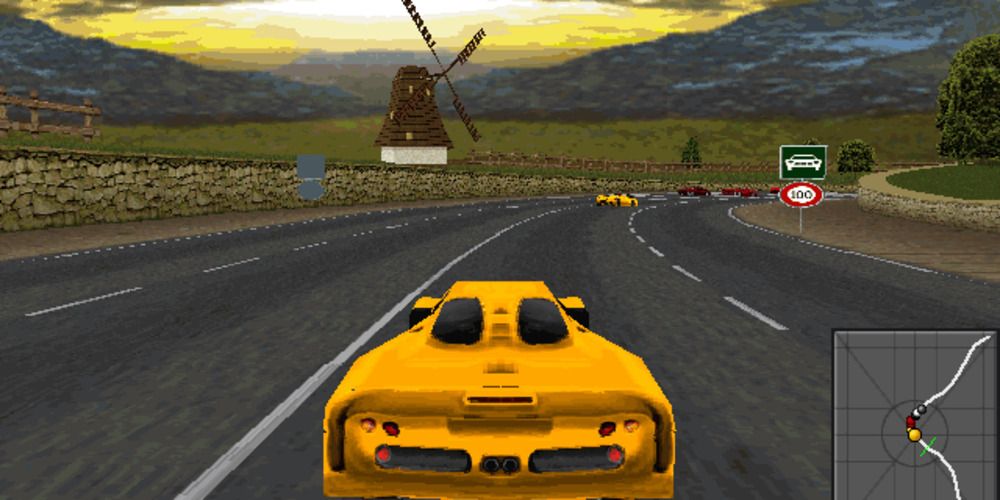 A yellow MacLaren rides through the countryside in Need For Speed 2