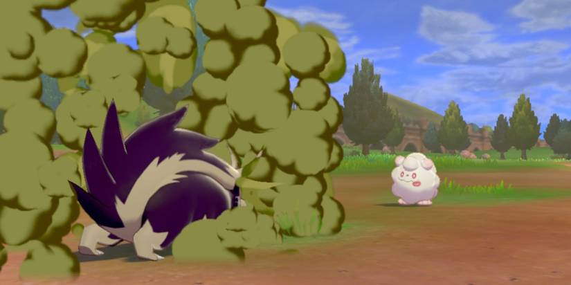 Pokemon Skuntank using Corrosive Gas on Swirlix