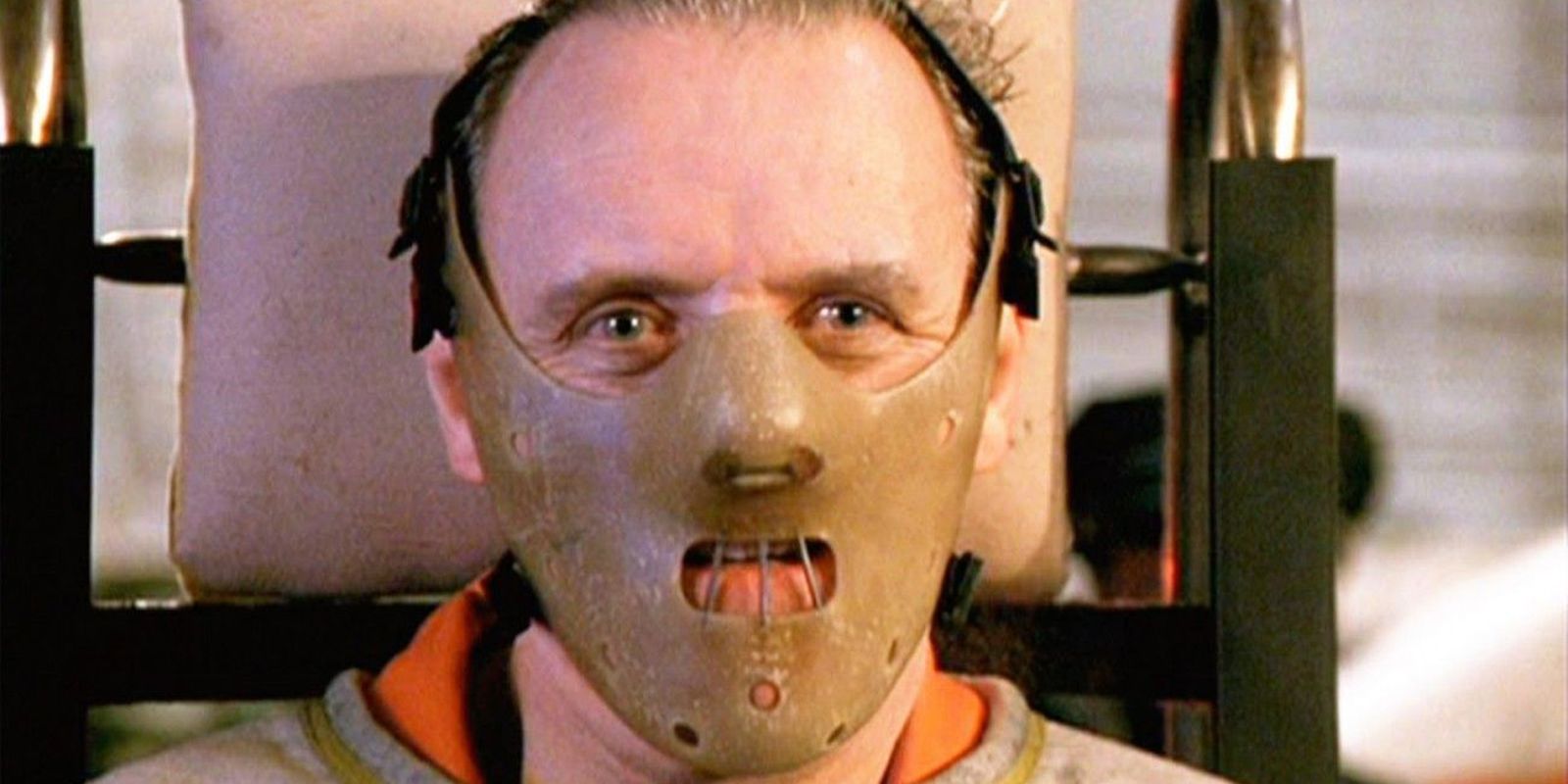 Hannibal Lecter in Silence of the Lambs wearing a bite mask and restraints