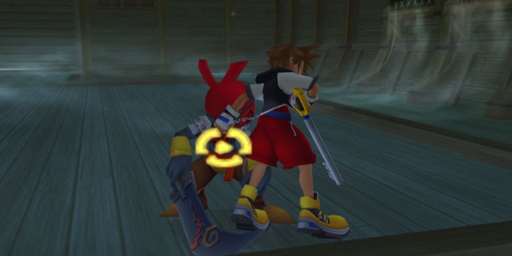 Sora Fighting Heartless in Kingdom Hearts Chain of Memories