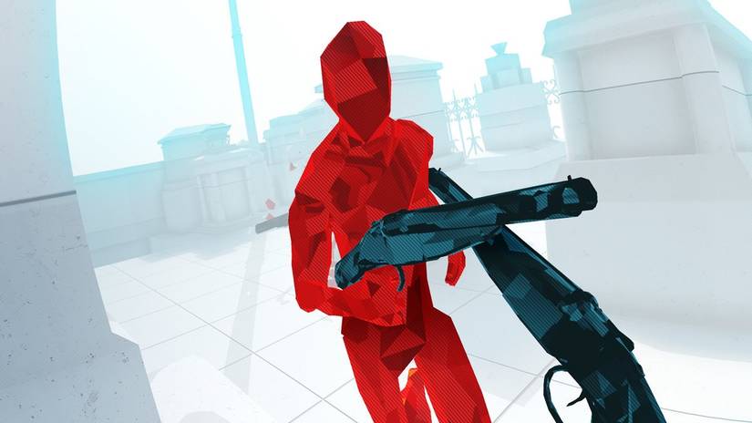 Guns pointed at one another with red pixelated figure in Superhot