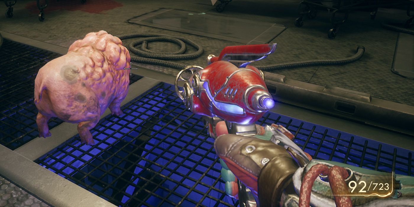 Outer Worlds gun pointed at a pig