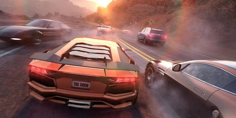 Close up of cars zipping across crowded street cinematic in The Crew