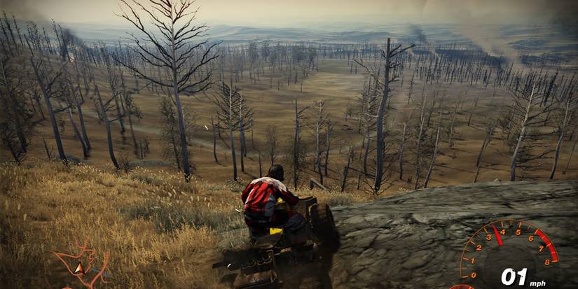 A character driving a quad bike down a hill in Fuel