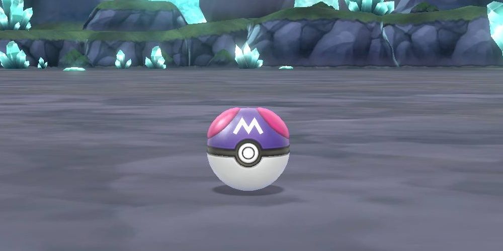 Master Ball catching Mewtwo in Cerulean Cave in Pokemon Let's Go game Cropped