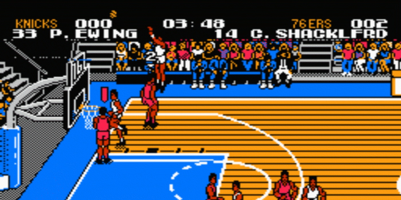 Playing Tecmo NBA basketball on blue court