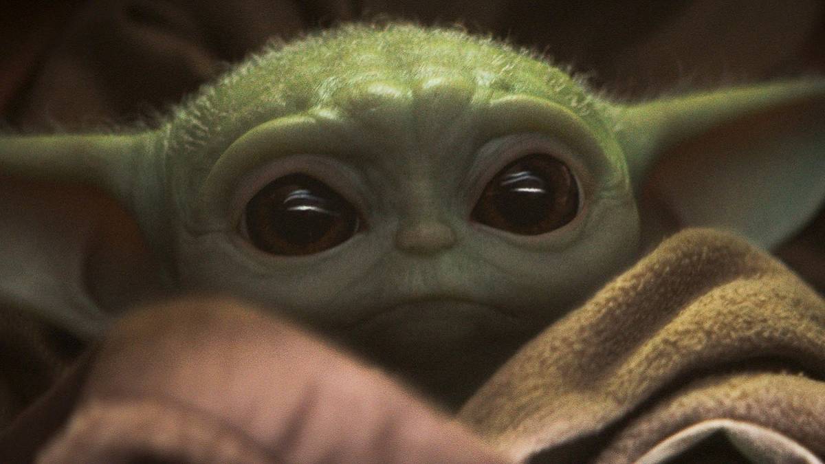 baby yoda in stroller