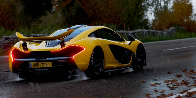Forza Horizon 4 McLaren P1 back view cobblestone wooded street