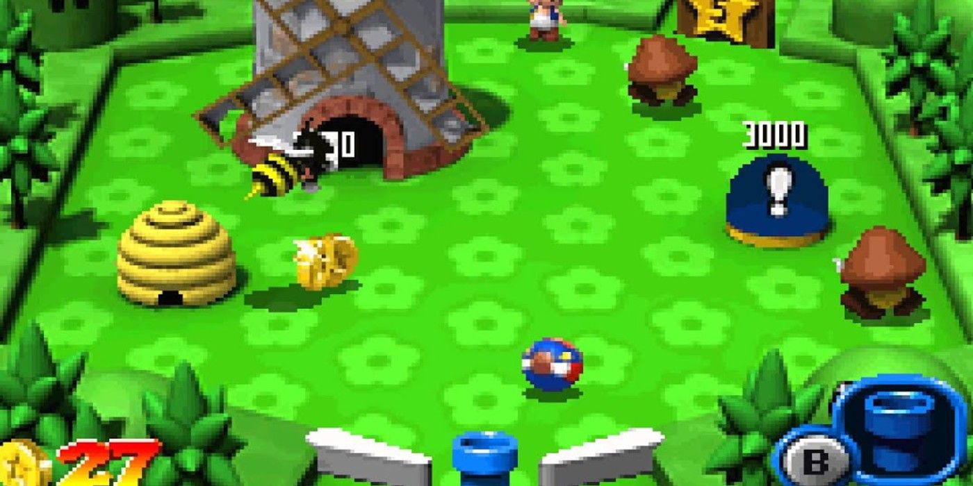 Mario Pinball Land GBA beehive and goombas in green pinball environment