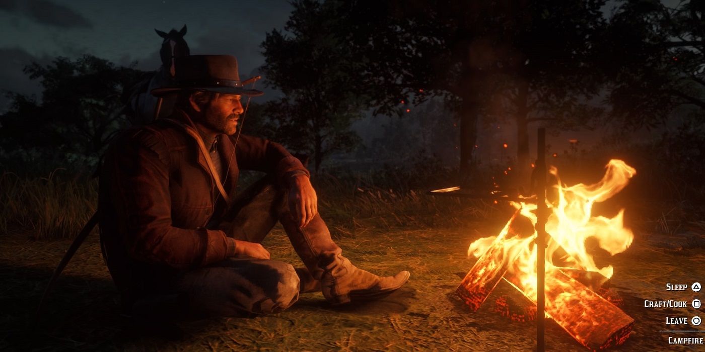 Red-dead-redemption-2-at-a-campfire
