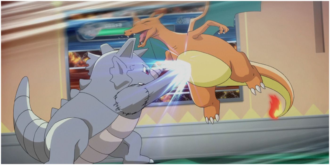 Rhyhorn punching Charizard in Pokemon anime