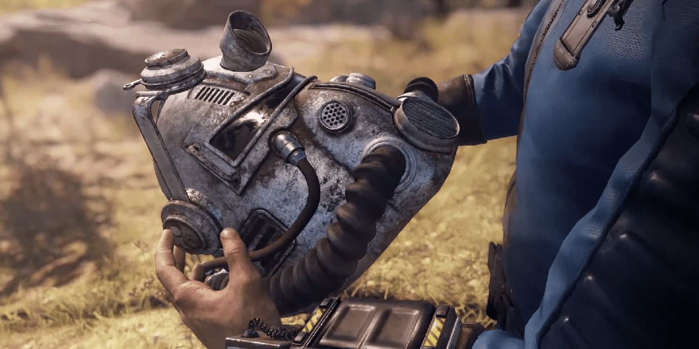 Fallout 76 man holding power armor helmet