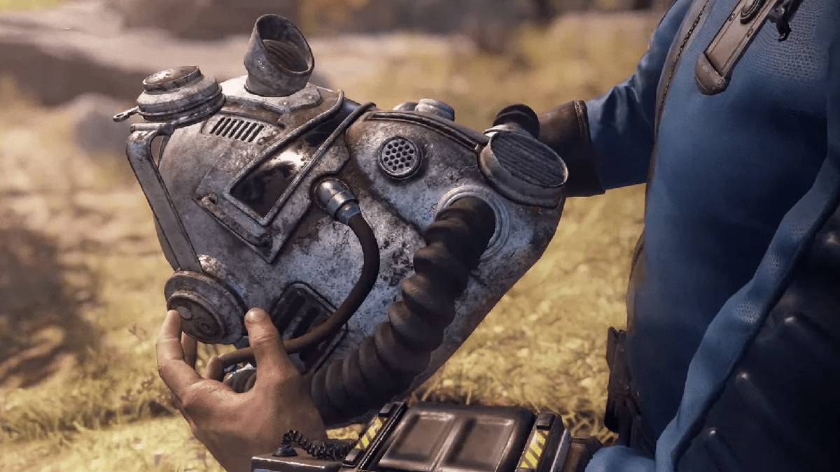Fallout 76 man holding power armor helmet