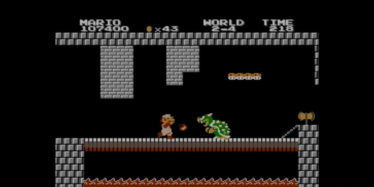 Mario with fire flower facing off with Bowser on bridge in castle in Super Mario Bros. NES