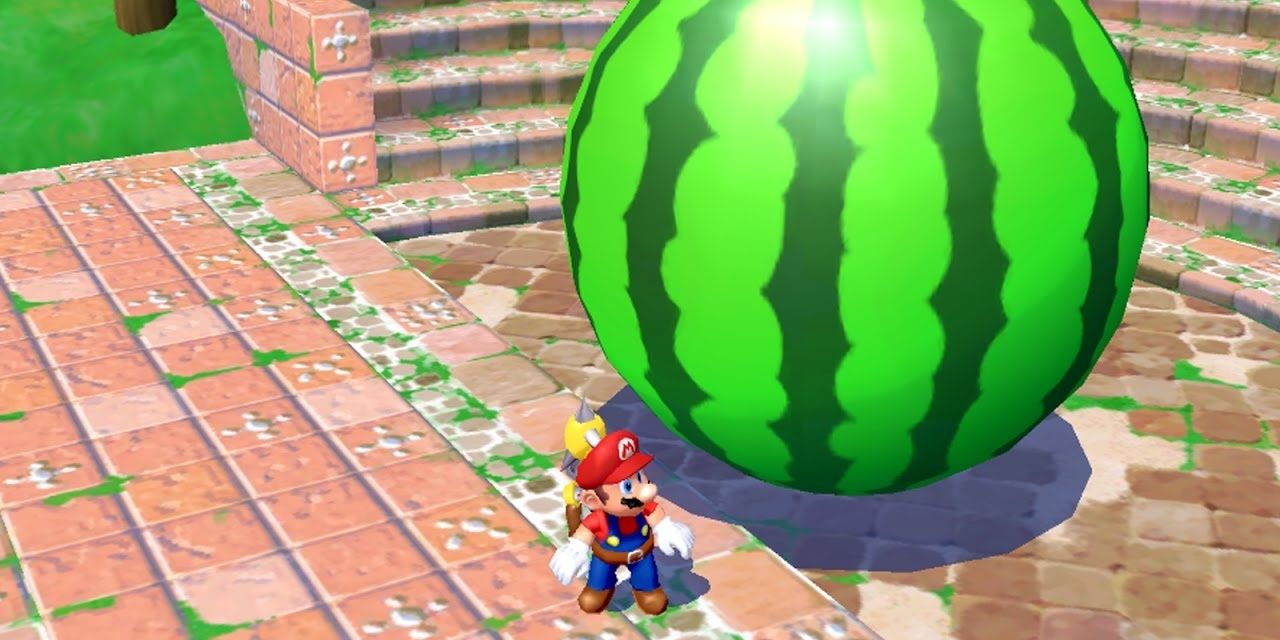 Mario standing next to a giant watermelon on cobblestone steps in Super Mario Sunshine