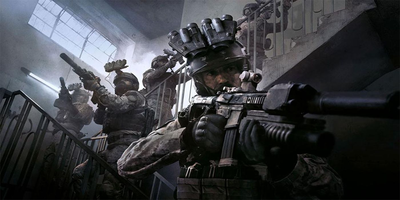 Four soldiers moving through a stairwell