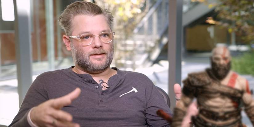 Cory Barlog with blurry Kratos