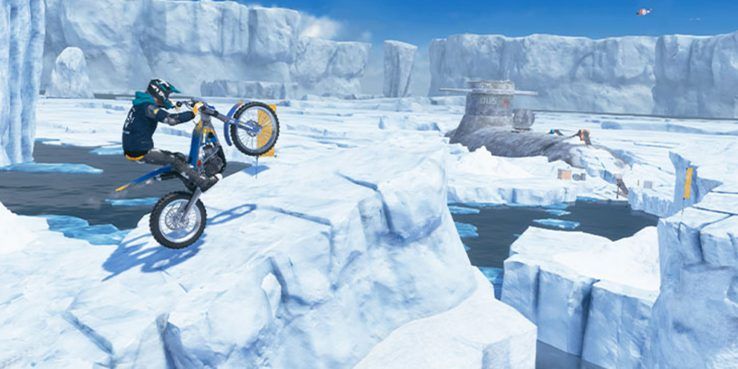 trials rising biker on a glacier