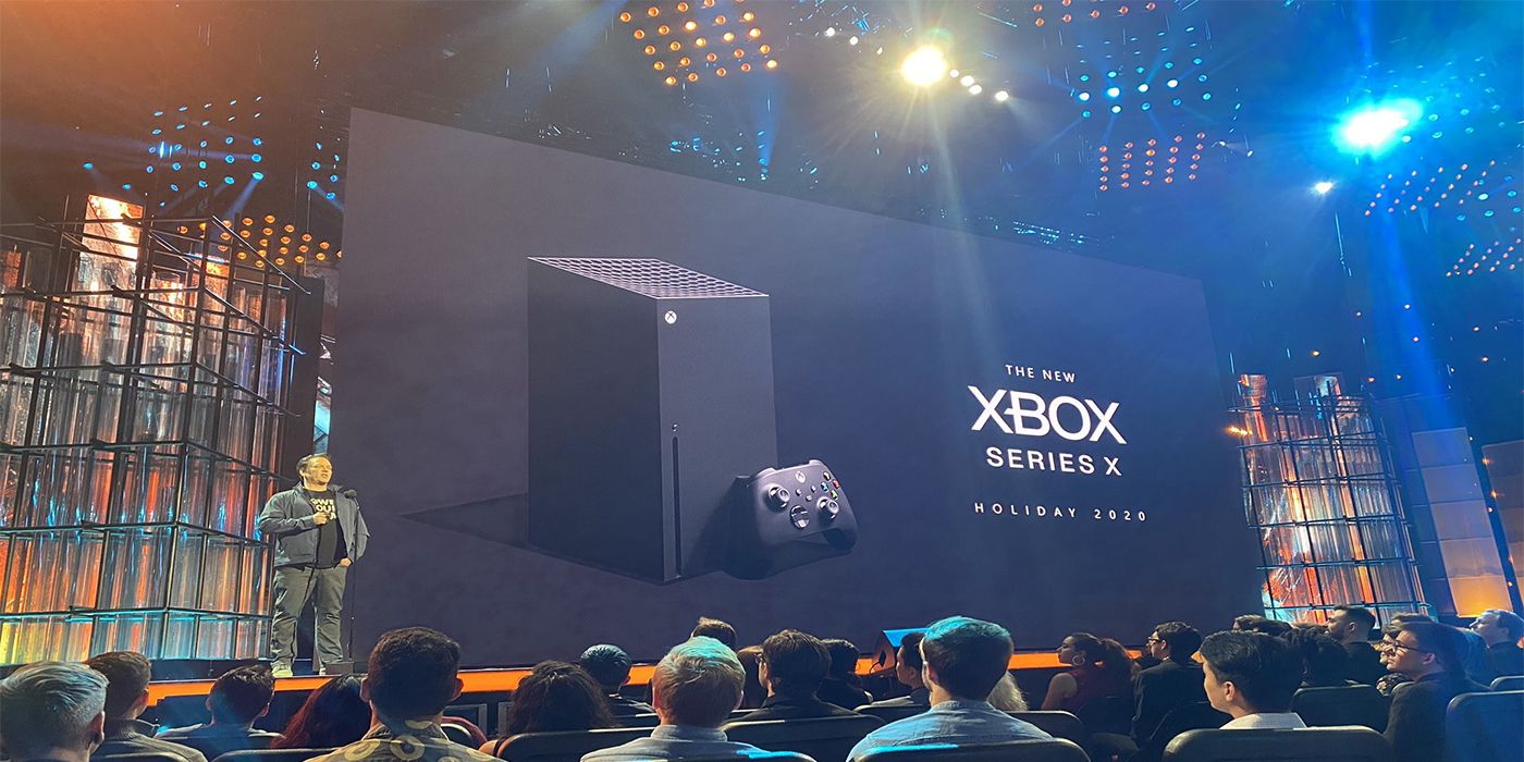 Phil Spencer next to Xbox Series X ad