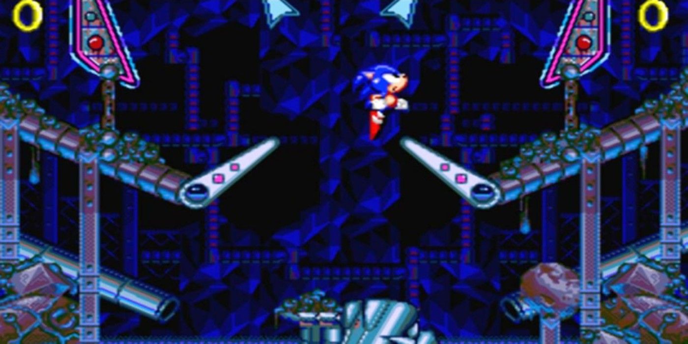 Sonic the Hedgehog jumping toward pinball flippers in Sonic Spinball.