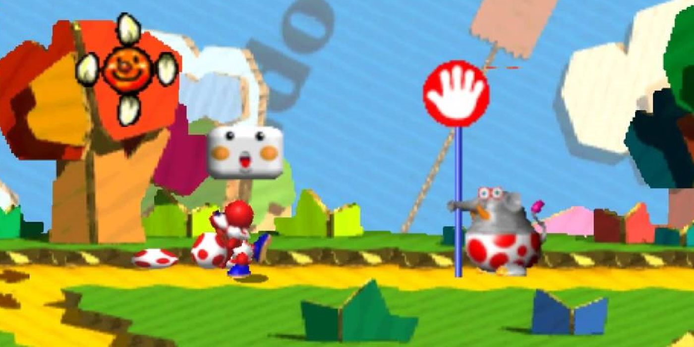 Yoshi's Story Gameplay red Yoshi aiming egg at enemy holding hand sign