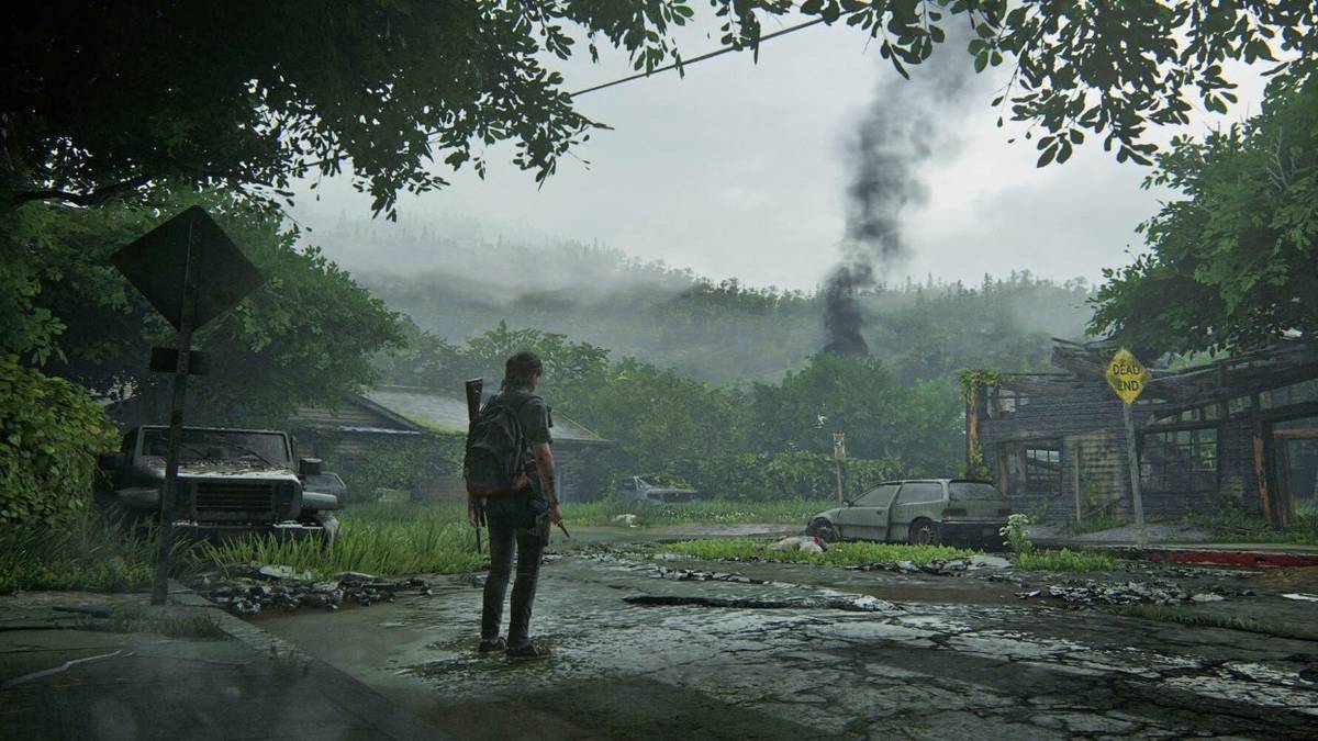 last of us part 2 ellie standing on a road in town