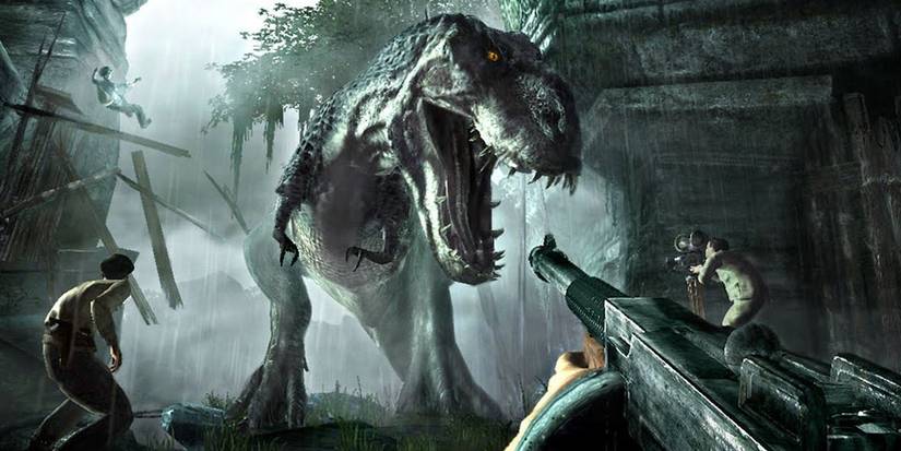 A gun pointing at a dinosaur