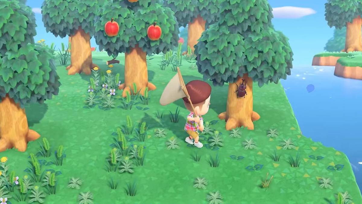 animal crossing new horizons trailer screenshot catching a beetle