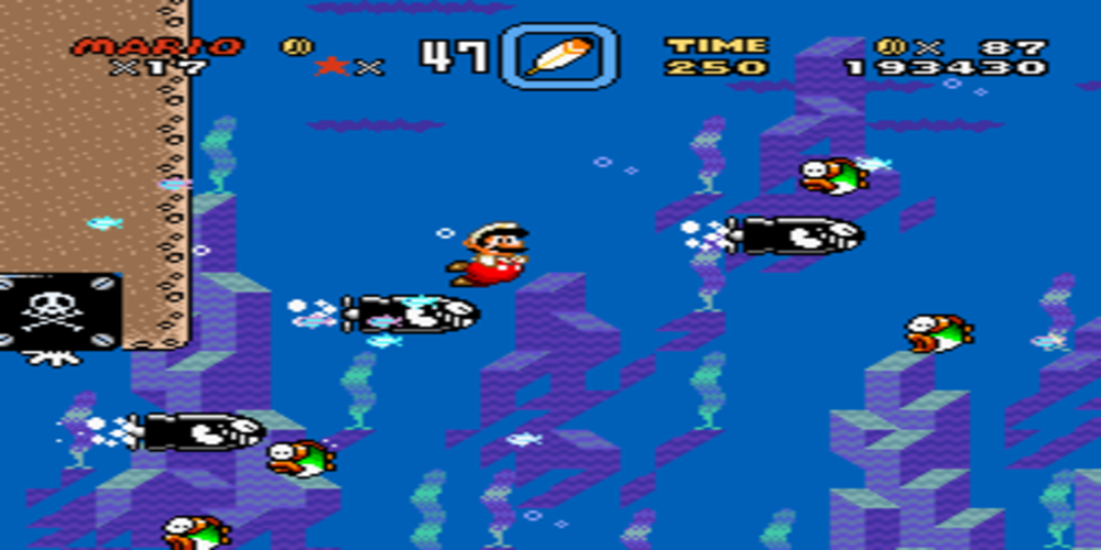 Super Mario World swimming through bullet bills and fish underwater