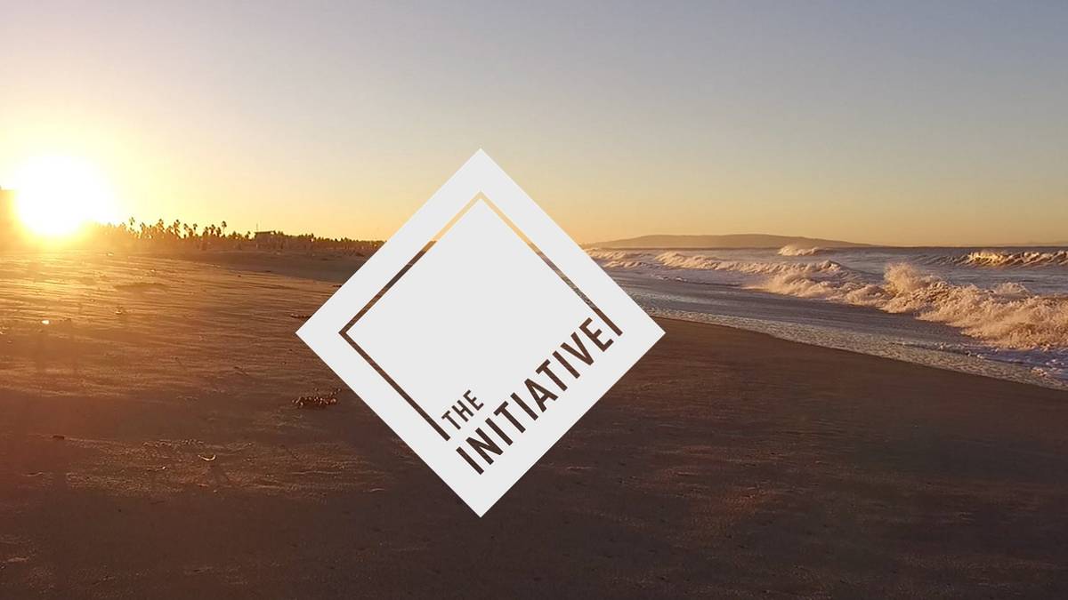 initiative logo over beach