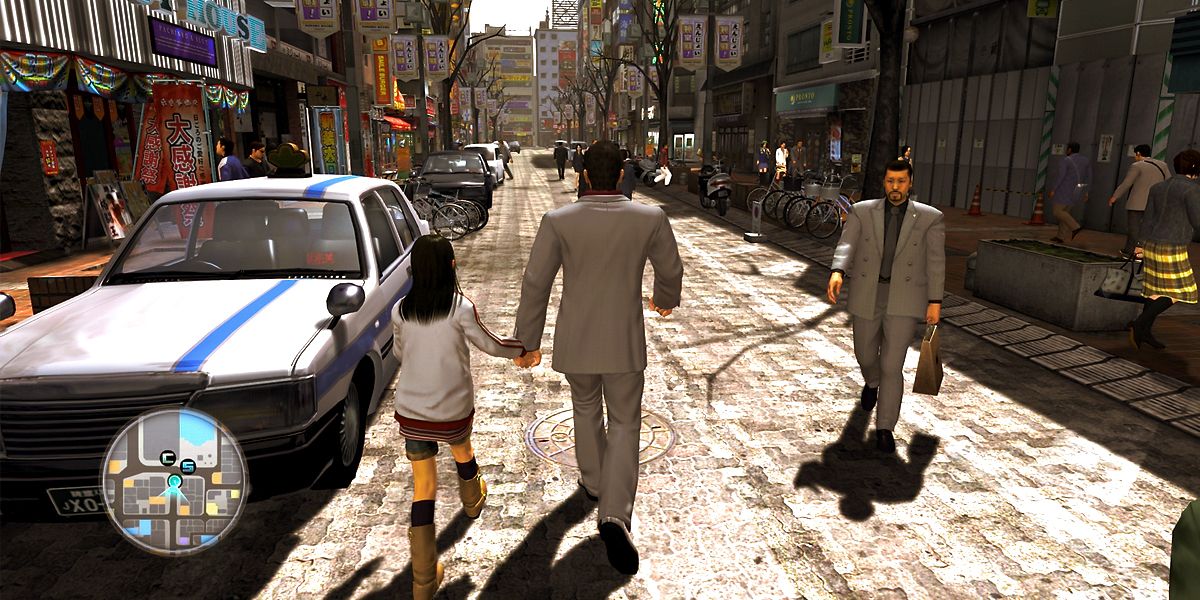 The Yakuza Remastered Collection - walking down a street in daytime