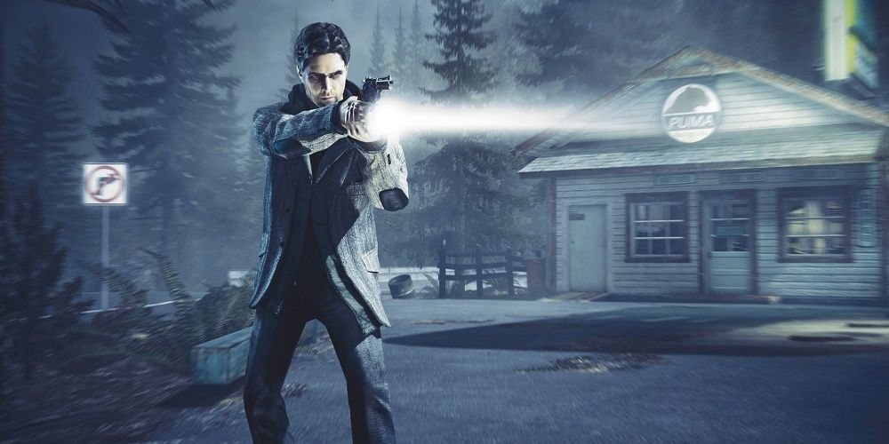 Alan Wake with gun and torch