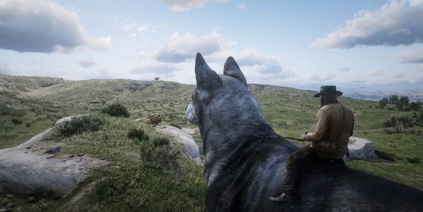 Arthur Morgan riding a giant dog.