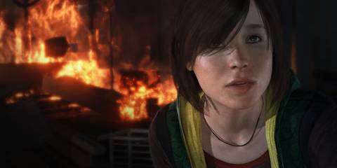 Elliot Page in Beyond: Two Souls. Closeup of his character Jodie standing outside a burning building.