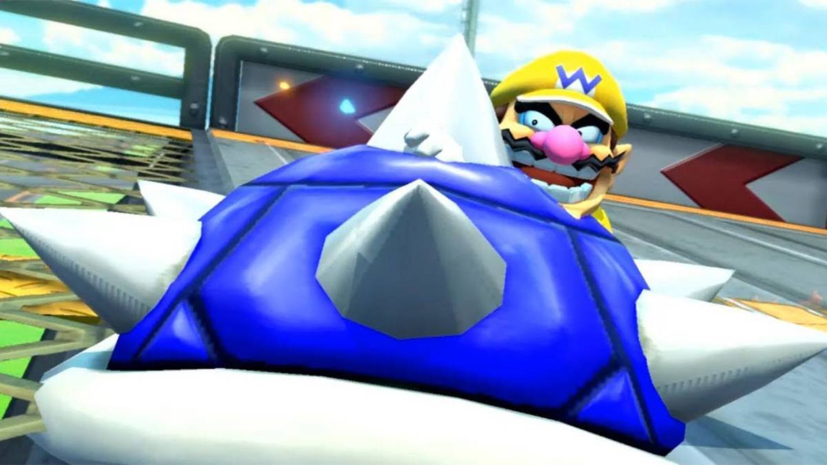 Wario throwing blue shell