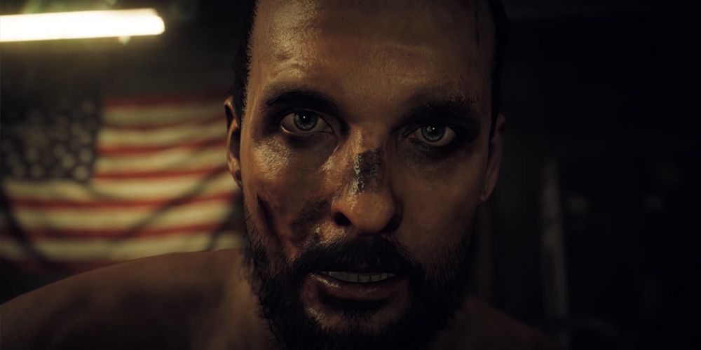 Far-Cry-5-Joseph-In-Front-Of-American-Flag