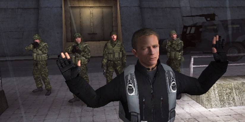 James Bond being held at gunpoint