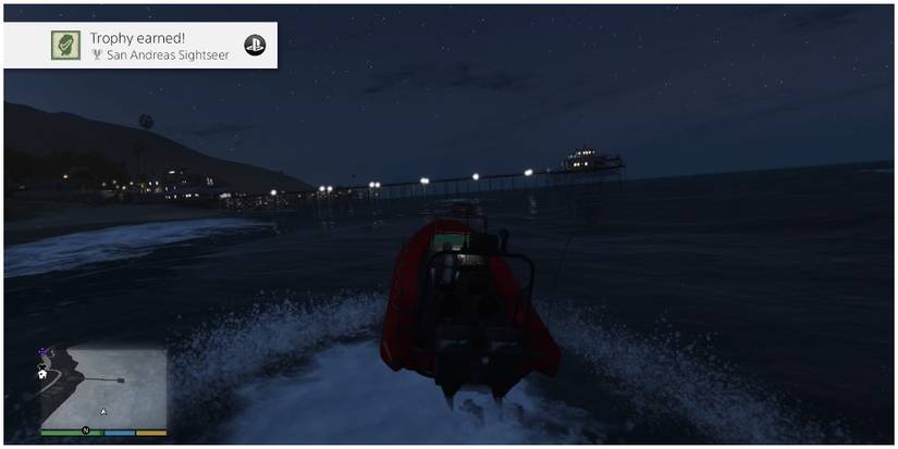 A player driving a boat at night
