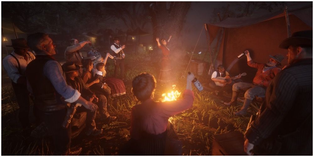 The gang gathered around a fire in RDR2