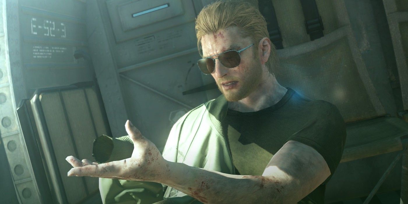 Kaz Miller holding his hand out to the sun in a helicopter