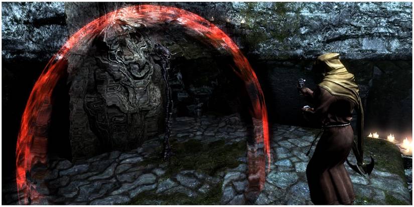 A priest near a shrine of Vaermina