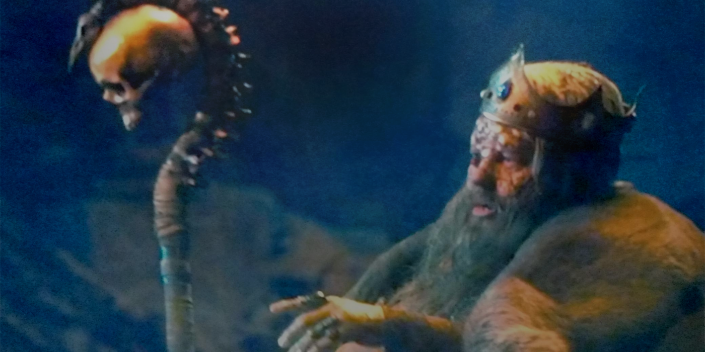 Lord Rugen in Cursed holds a skull staff.