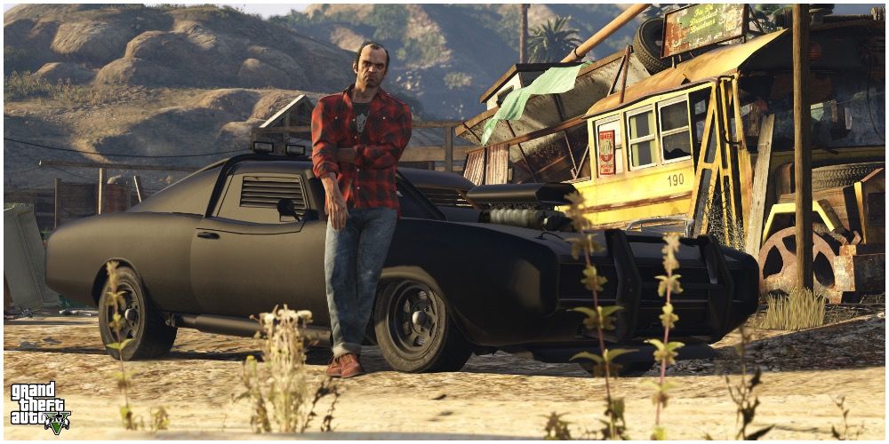 Trevor Phillips leaning on a car