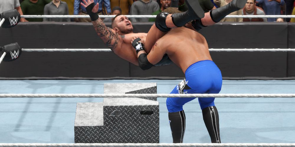 WWE-2K20-Edge-Powerbomb-Randy-Orton-On-Steel-Steps
